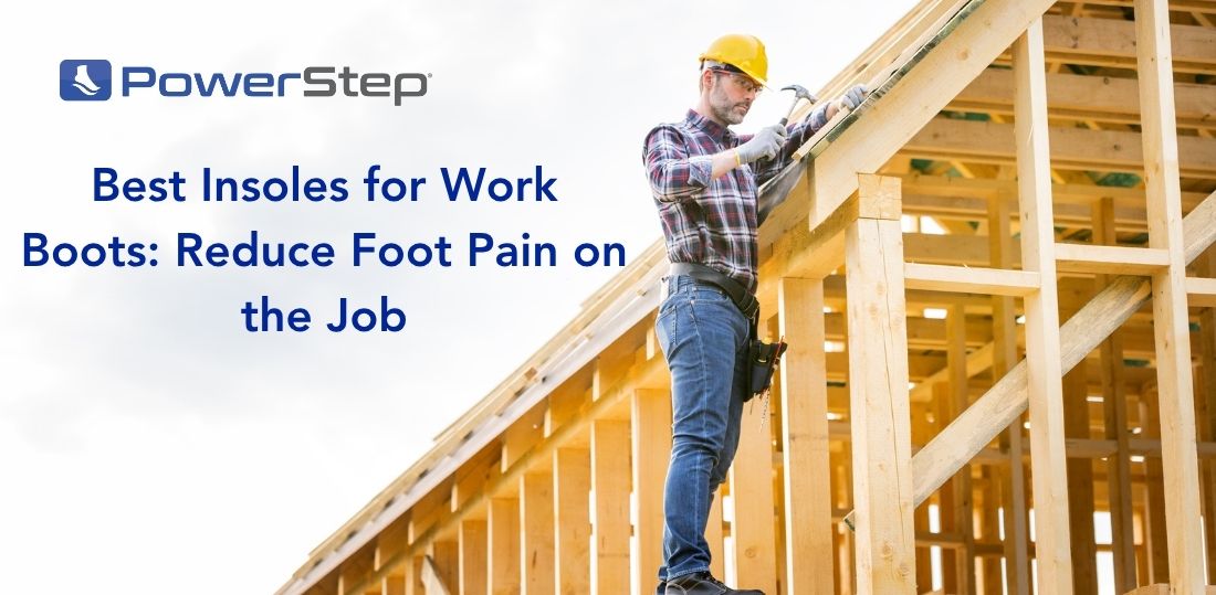 Man in a hard hat hammering a house