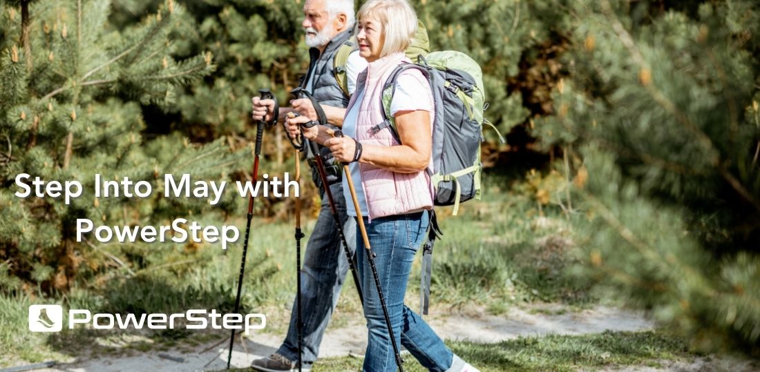 Older couple hiking on a trail