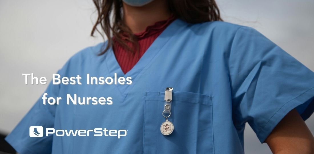 A nurse in blue scrubs