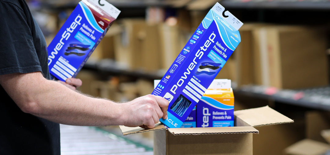 Man packing PowerStep orders for shipping to the customer